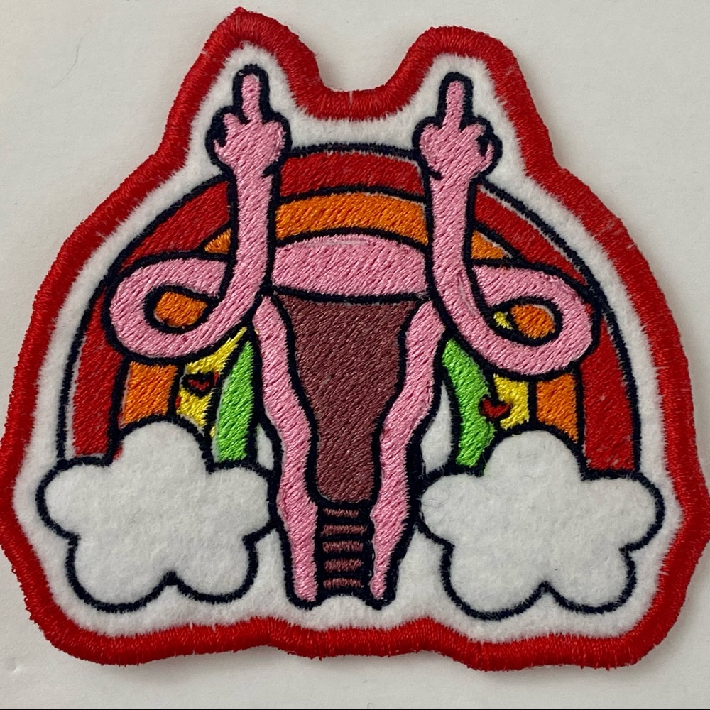 Rainbow Uterus Iron-on or Sew-on Patch. Measures approx 3”x 4”.